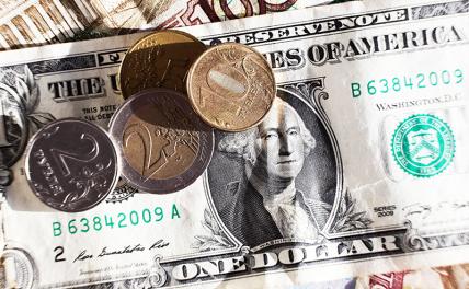 Новости курса валют: доллар осваивается выше 70